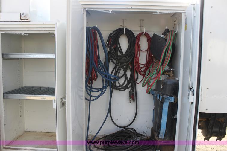 image for item E8416 1999 Freightliner FLD semi service truck