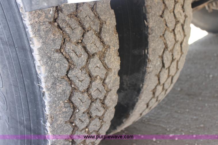 image for item E8416 1999 Freightliner FLD semi service truck