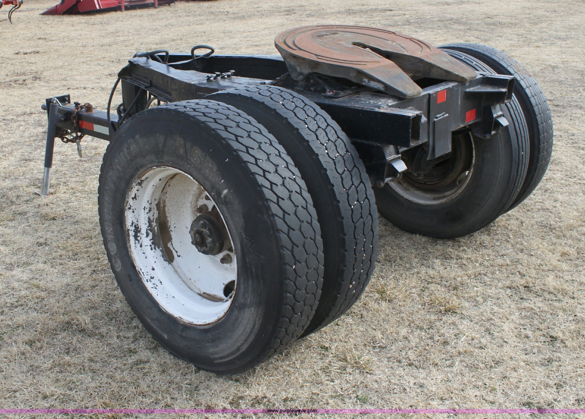 Semi truck dolly in Oxford, KS Item E8401 sold Purple Wave
