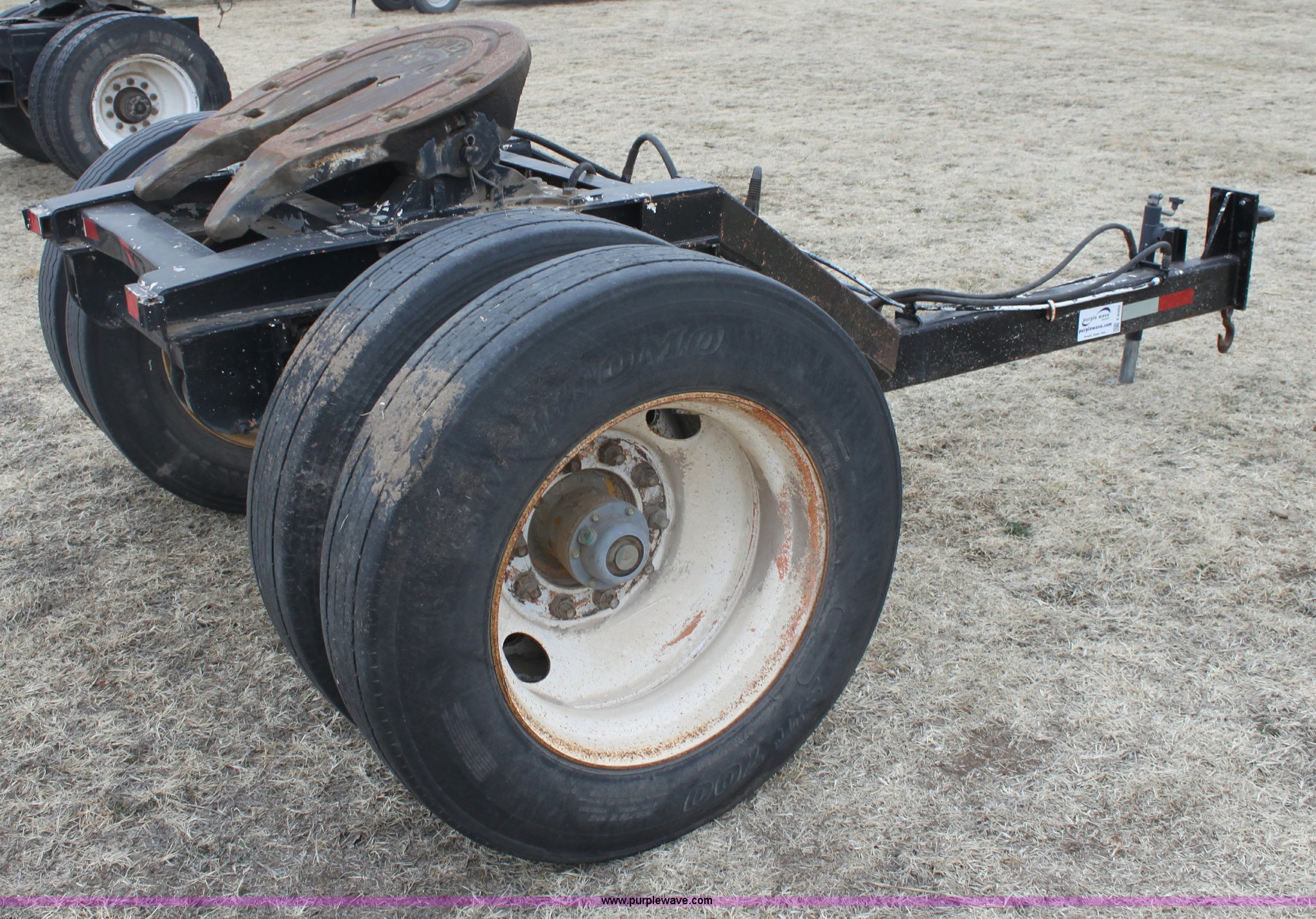 Semi truck dolly in Oxford, KS Item E8402 sold Purple Wave