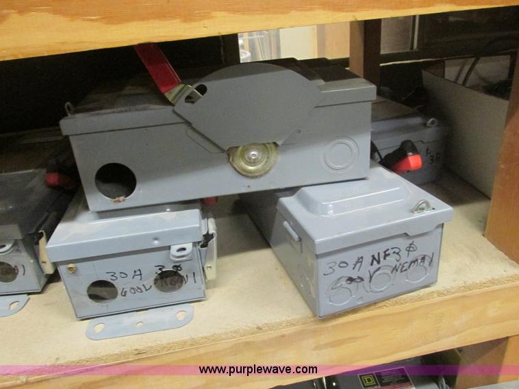 image for item F4244 Assorted electrical breaker boxes and switches