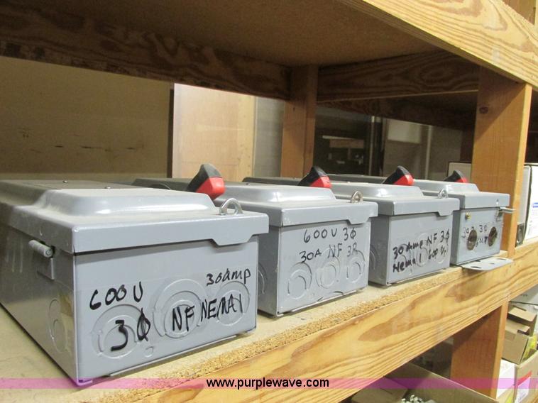 image for item F4244 Assorted electrical breaker boxes and switches