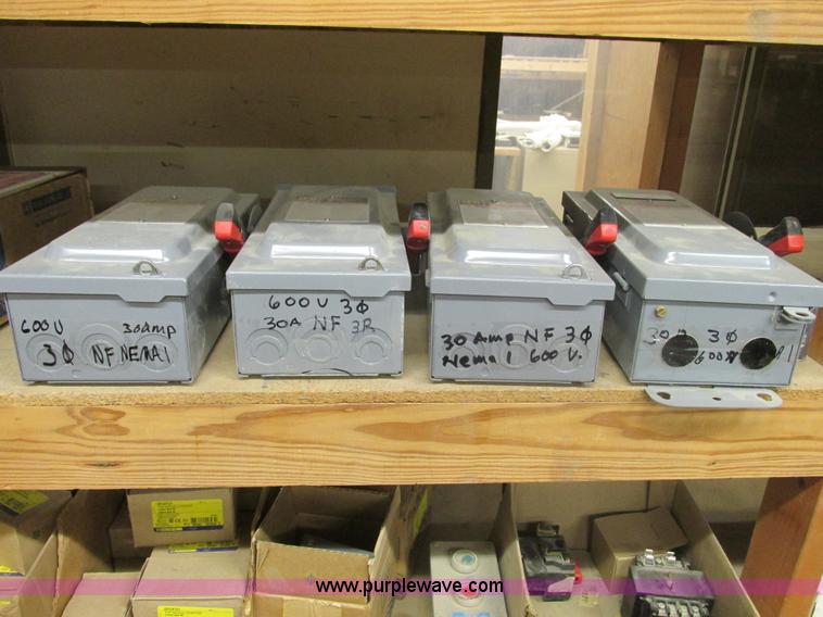 image for item F4244 Assorted electrical breaker boxes and switches