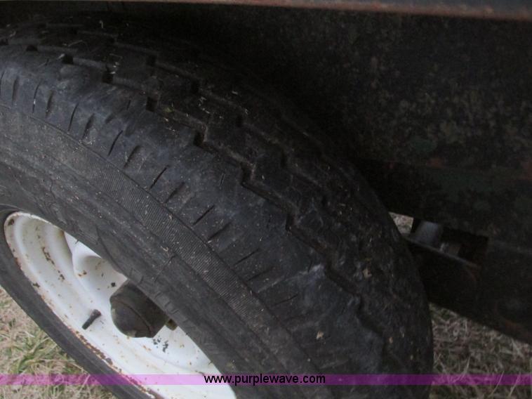 image for item F4283 1977 13' tandem axle trailer