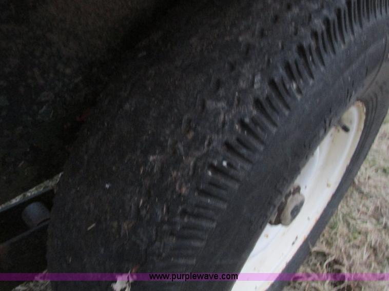 image for item F4283 1977 13' tandem axle trailer