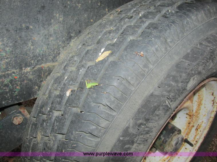 image for item F4283 1977 13' tandem axle trailer