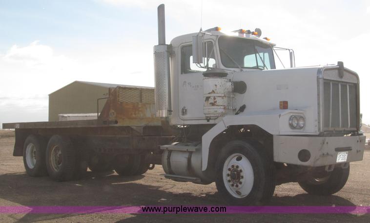 image for item B5387 1976 Kenworth C500 tandem axle flatbed truck