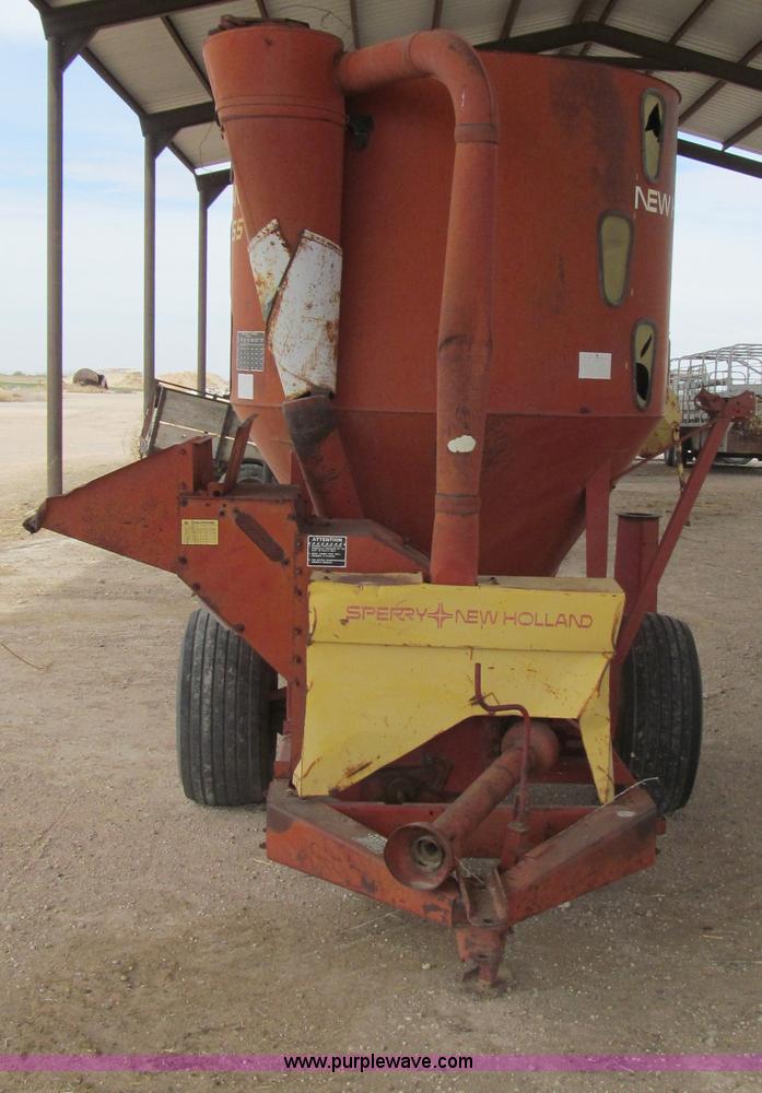 image for item C3563 New Holland 355 feed mixer