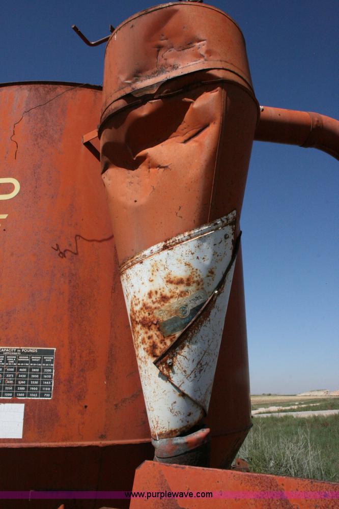 image for item C3563 New Holland 355 feed mixer