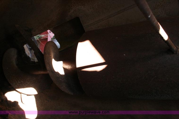 image for item C3563 New Holland 355 feed mixer