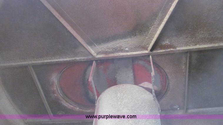 image for item C3563 New Holland 355 feed mixer