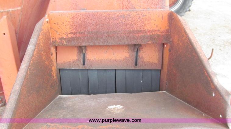 image for item C3563 New Holland 355 feed mixer