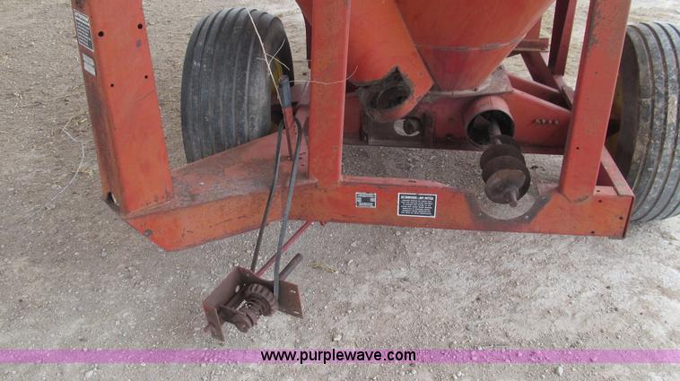 image for item C3563 New Holland 355 feed mixer