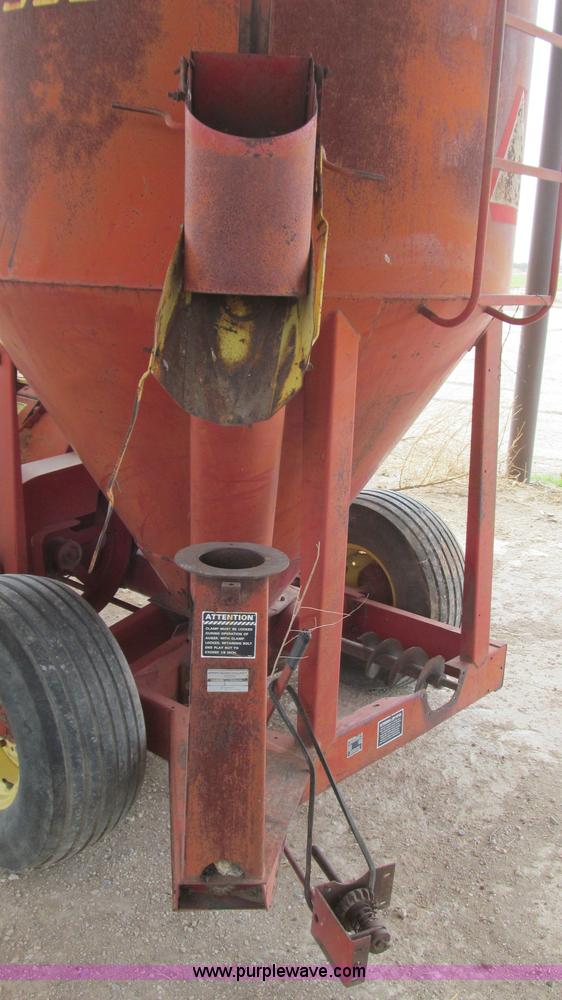 image for item C3563 New Holland 355 feed mixer