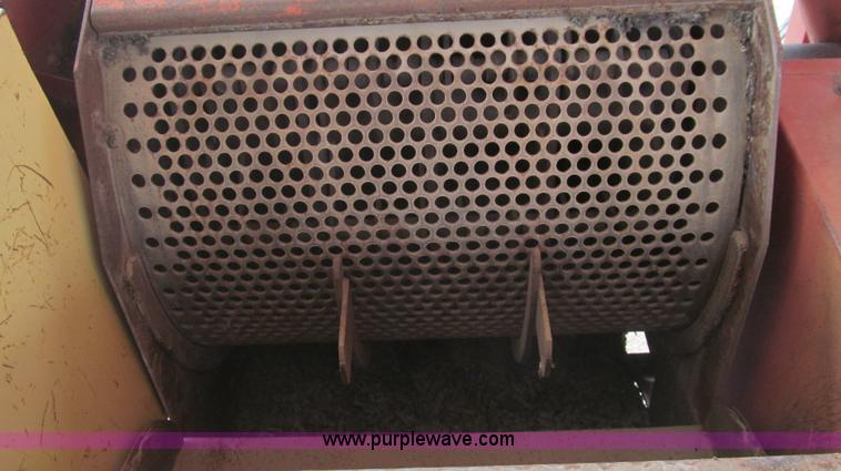 image for item C3563 New Holland 355 feed mixer