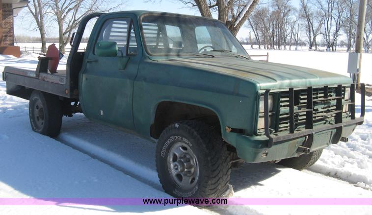 image for item E3106 1985 Chevrolet flatbed pickup truck
