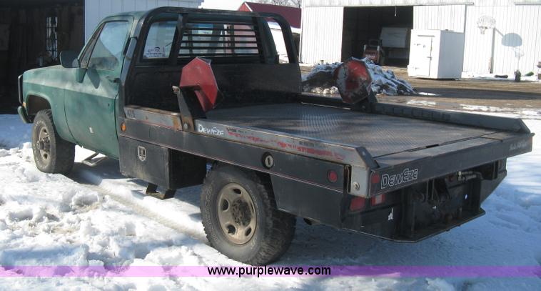 image for item E3106 1985 Chevrolet flatbed pickup truck