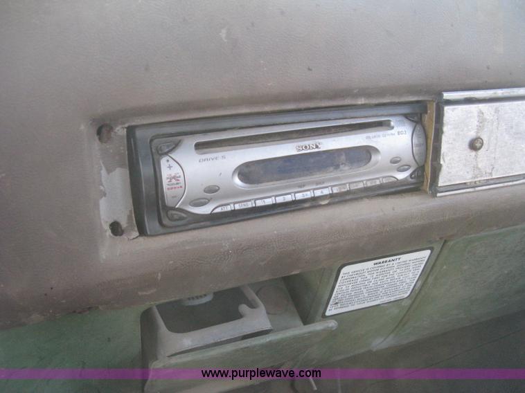 image for item E3106 1985 Chevrolet flatbed pickup truck