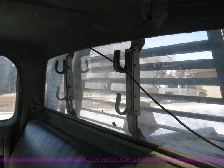 image for item E3106 1985 Chevrolet flatbed pickup truck