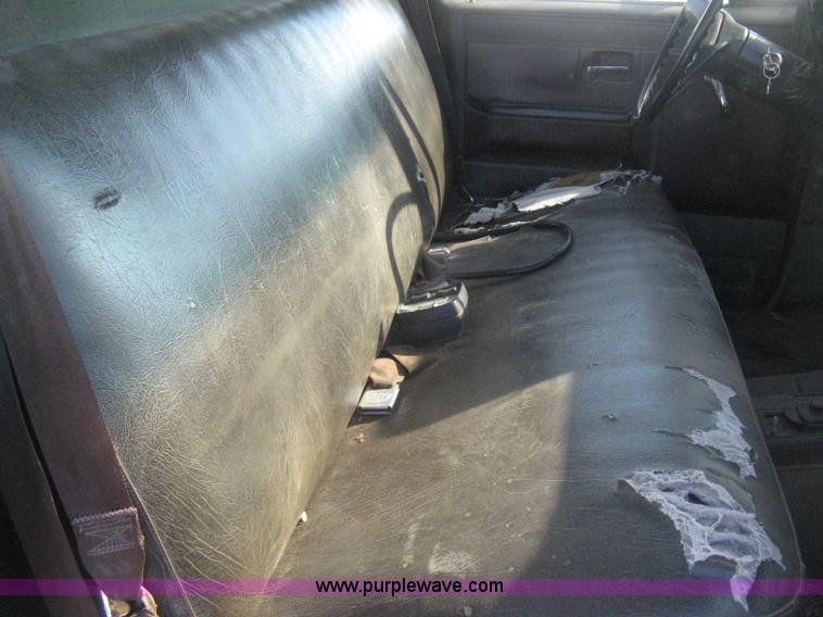 image for item E3106 1985 Chevrolet flatbed pickup truck