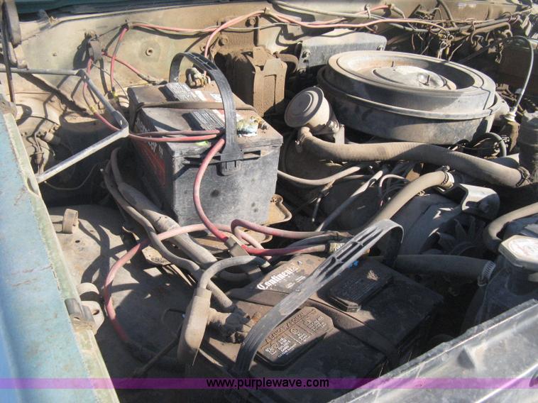 image for item E3106 1985 Chevrolet flatbed pickup truck