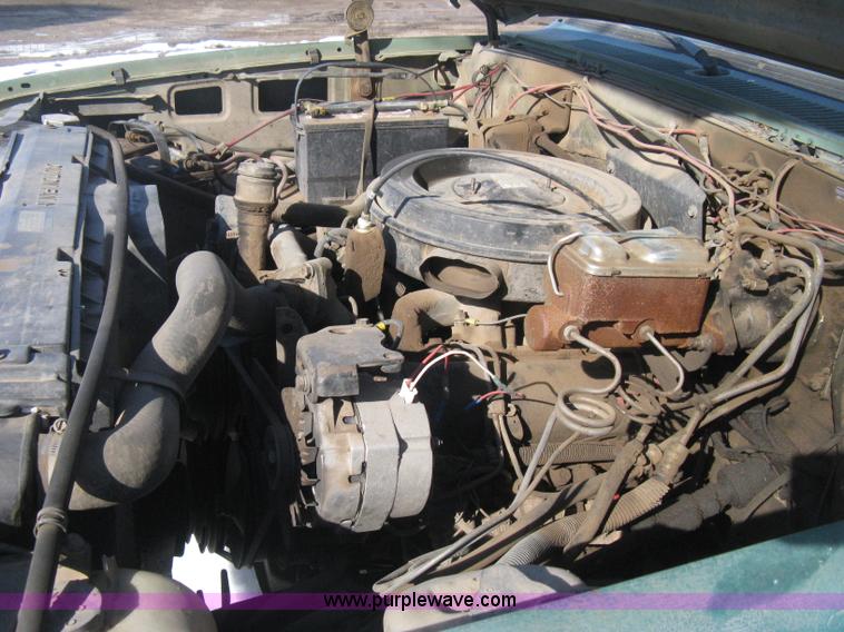 image for item E3106 1985 Chevrolet flatbed pickup truck