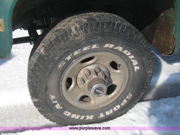 image for item E3106 1985 Chevrolet flatbed pickup truck