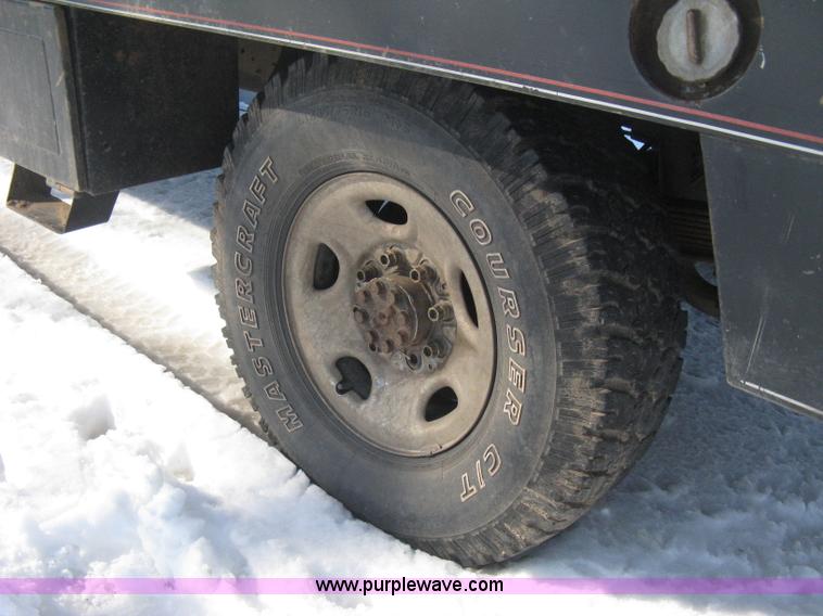 image for item E3106 1985 Chevrolet flatbed pickup truck