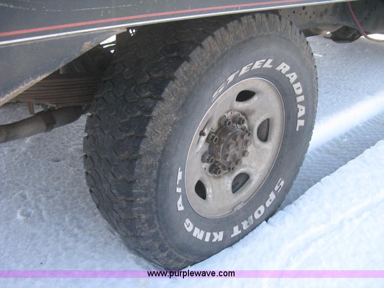 image for item E3106 1985 Chevrolet flatbed pickup truck