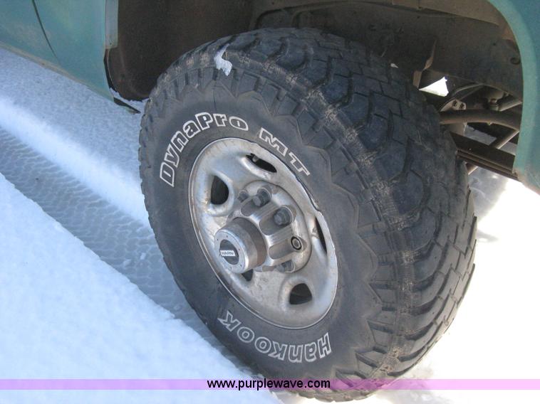 image for item E3106 1985 Chevrolet flatbed pickup truck