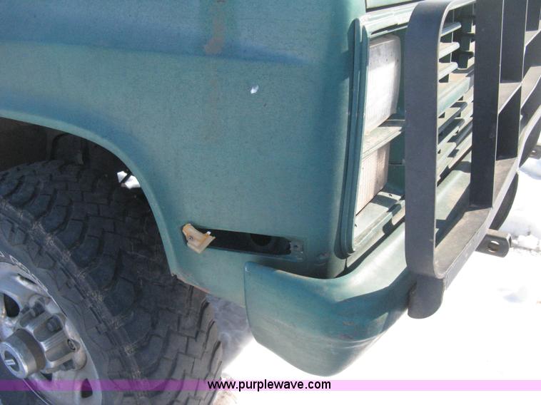 image for item E3106 1985 Chevrolet flatbed pickup truck