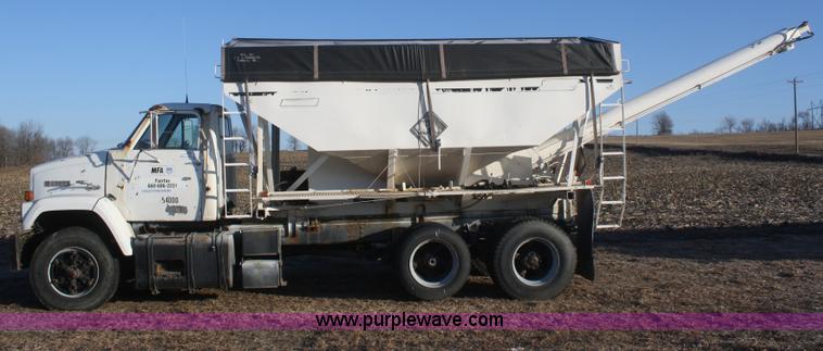 image for item F2987 1986 GMC Brigadier dry fertilizer tender truck