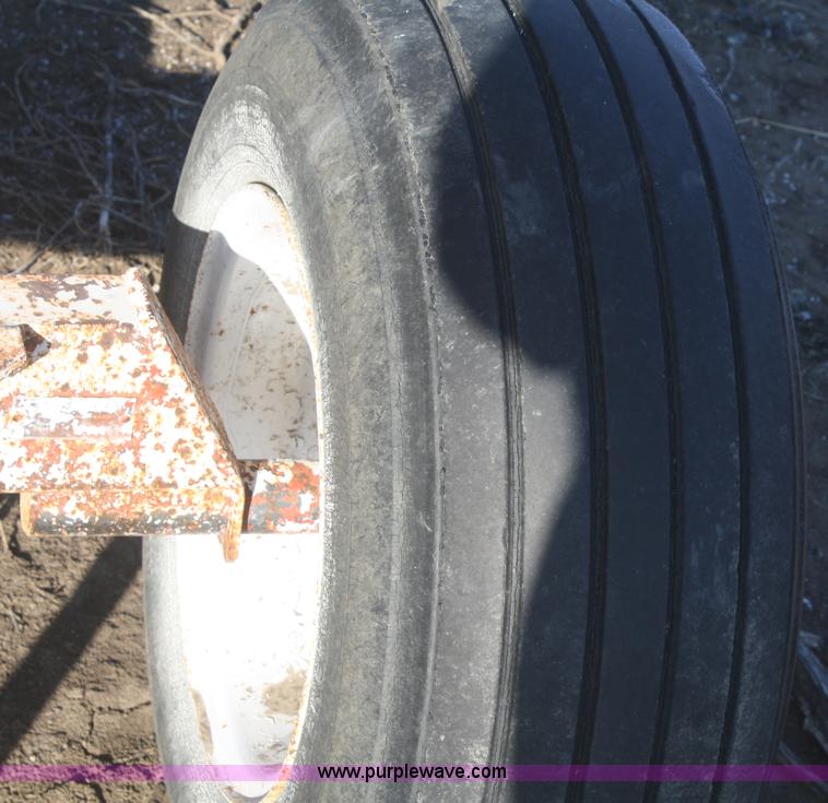 image for item F2988 1,000 gallon anhydrous ammonia tank on running gear