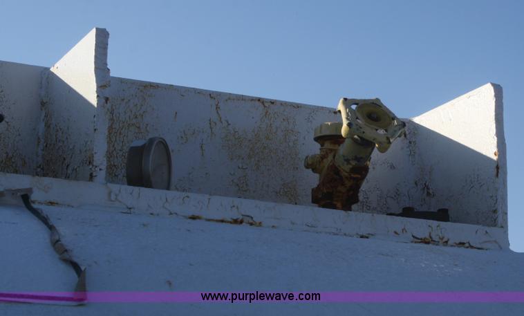 image for item F2988 1,000 gallon anhydrous ammonia tank on running gear