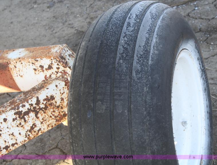 image for item F2988 1,000 gallon anhydrous ammonia tank on running gear