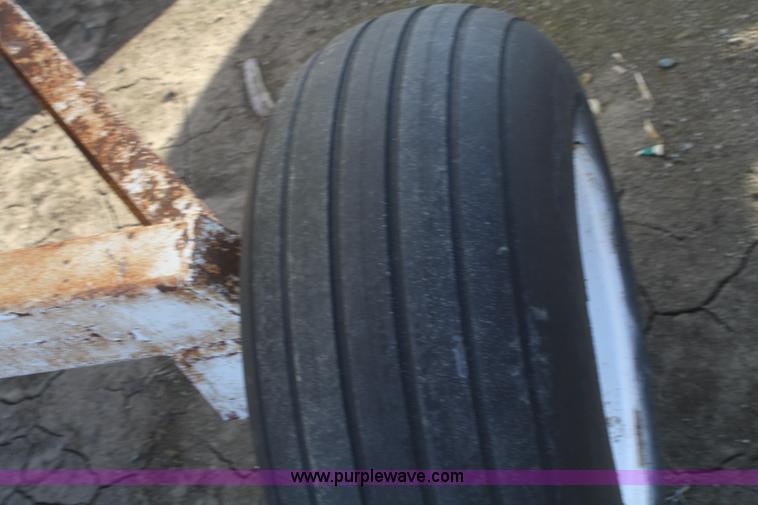 image for item F2988 1,000 gallon anhydrous ammonia tank on running gear