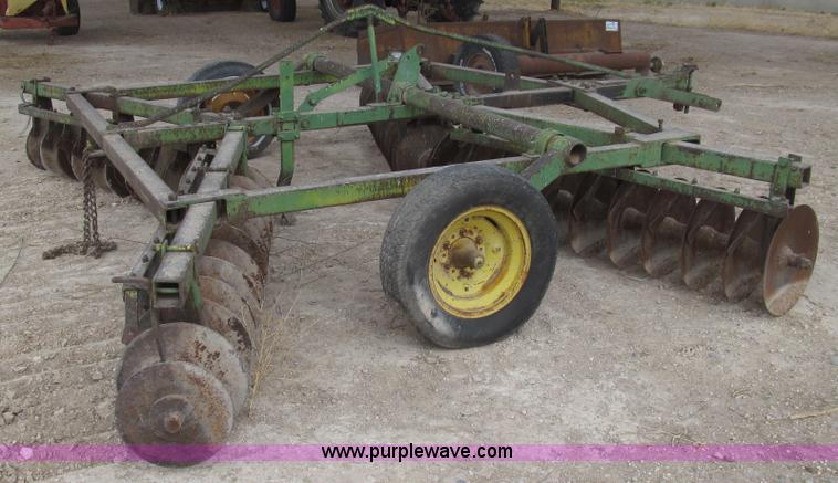 image for item G5647 John Deere 12' tandem disk plow