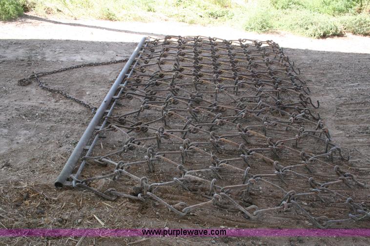 image for item T9020 11' x 6.5' drag chain harrow