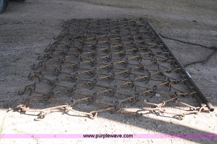 image for item T9020 11' x 6.5' drag chain harrow