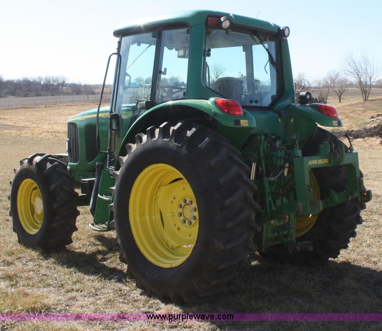 image for item V9511 2005 John Deere 6420 MFWD tractor