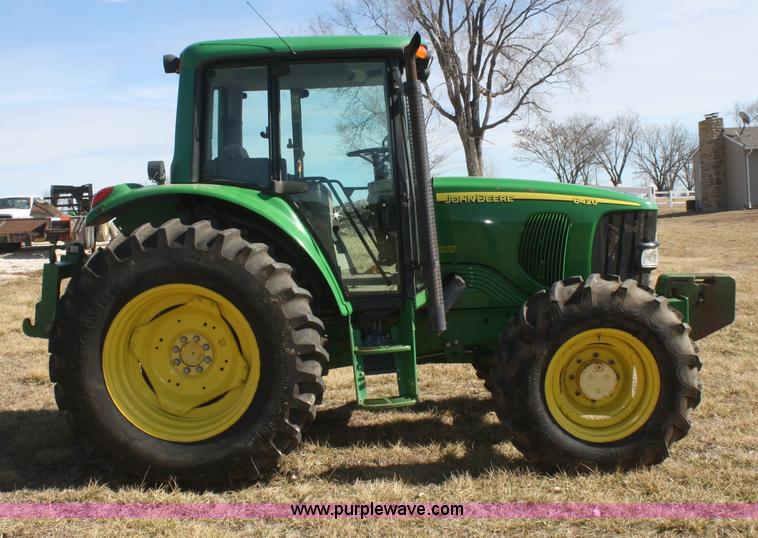 image for item V9511 2005 John Deere 6420 MFWD tractor