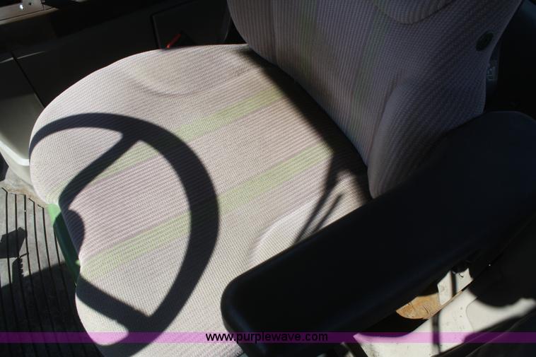 image for item V9511 2005 John Deere 6420 MFWD tractor