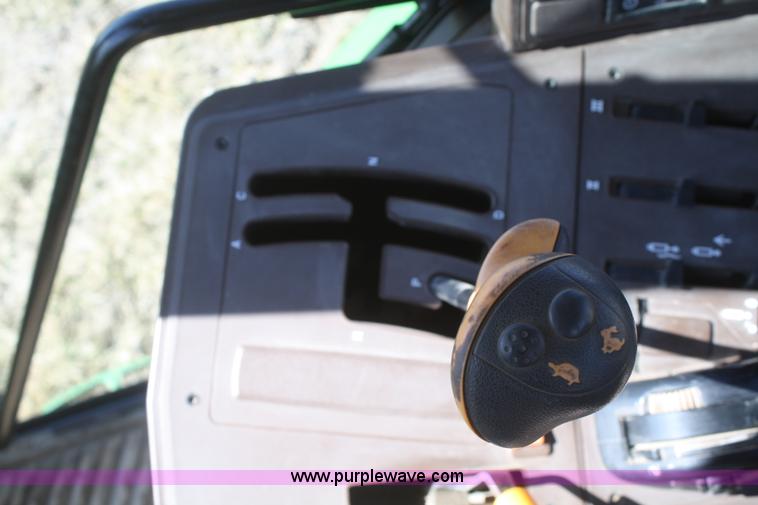 image for item V9511 2005 John Deere 6420 MFWD tractor