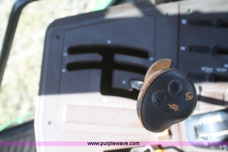 image for item V9511 2005 John Deere 6420 MFWD tractor