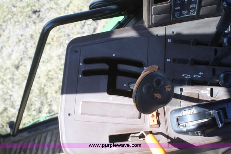 image for item V9511 2005 John Deere 6420 MFWD tractor