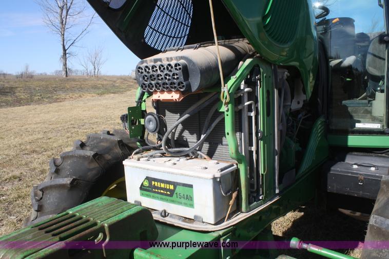 image for item V9511 2005 John Deere 6420 MFWD tractor