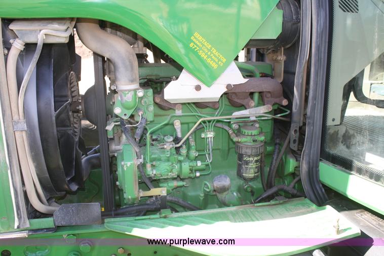 image for item V9511 2005 John Deere 6420 MFWD tractor