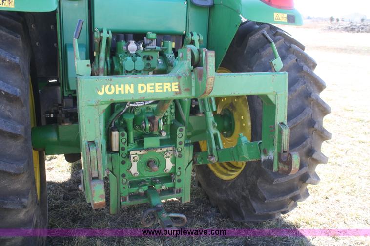 image for item V9511 2005 John Deere 6420 MFWD tractor