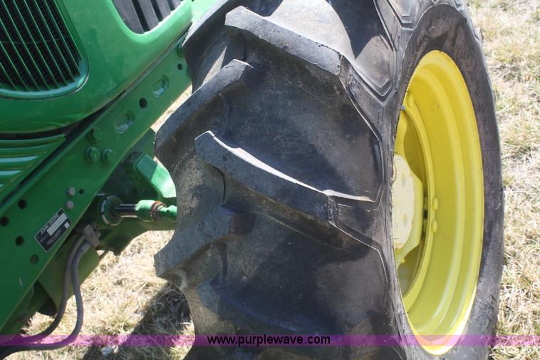 image for item V9511 2005 John Deere 6420 MFWD tractor
