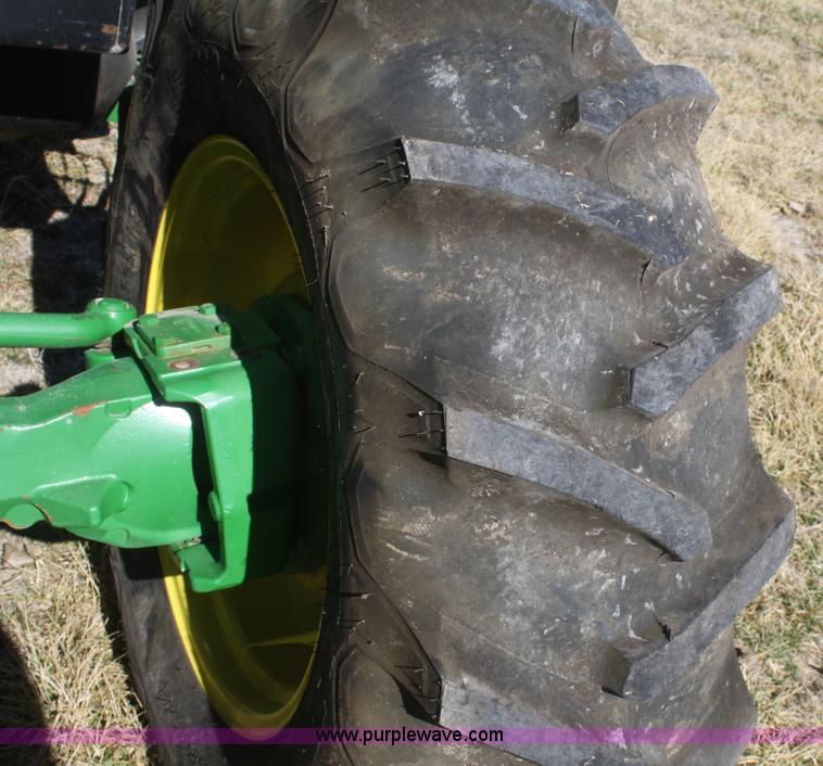 image for item V9511 2005 John Deere 6420 MFWD tractor